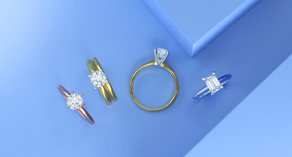Diamond solitaire engagement rings in rose, yellow, and white gold